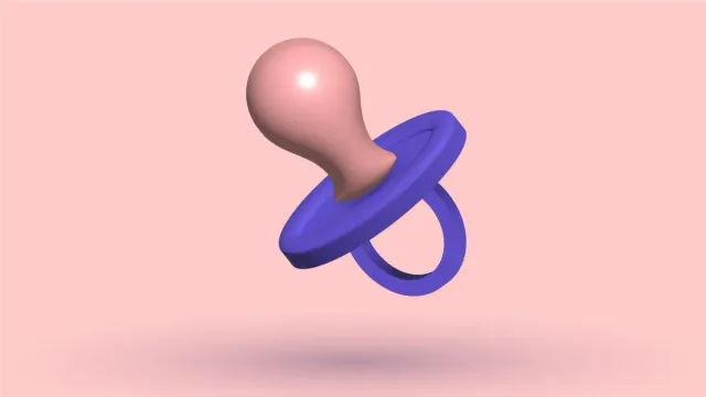 A 3D baby's pacifier, pink teat and blue shield