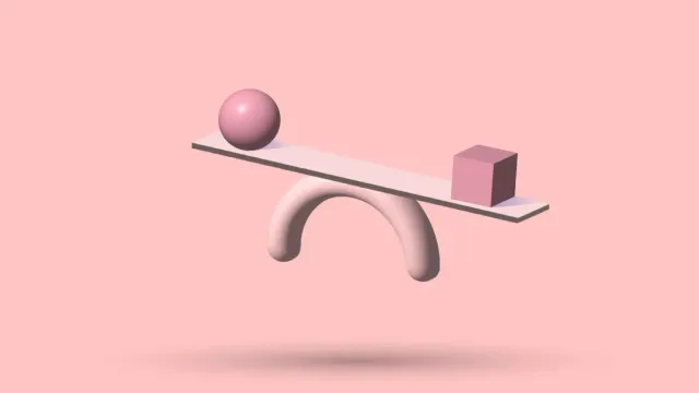 A 3D seesaw tipped out of balance, a sphere on the raised end and a cube on the lowered one